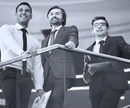 Executives on the office stairs